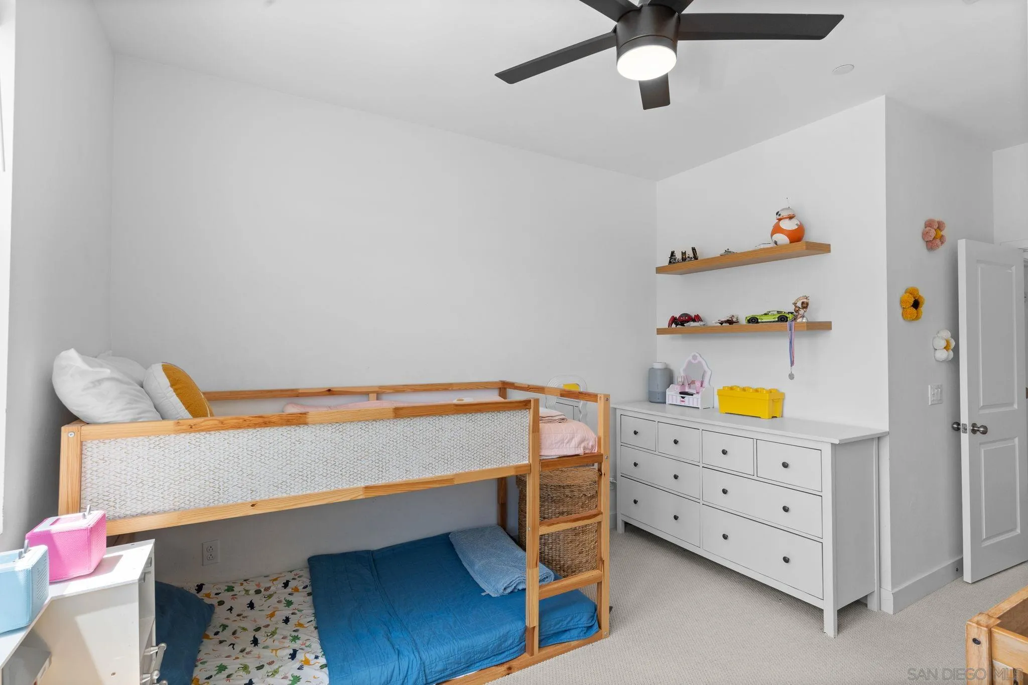 8702 Barbados Lane Santee, CA 92071 - Photo 29 of 39 a bedroom with a bed and a dresser