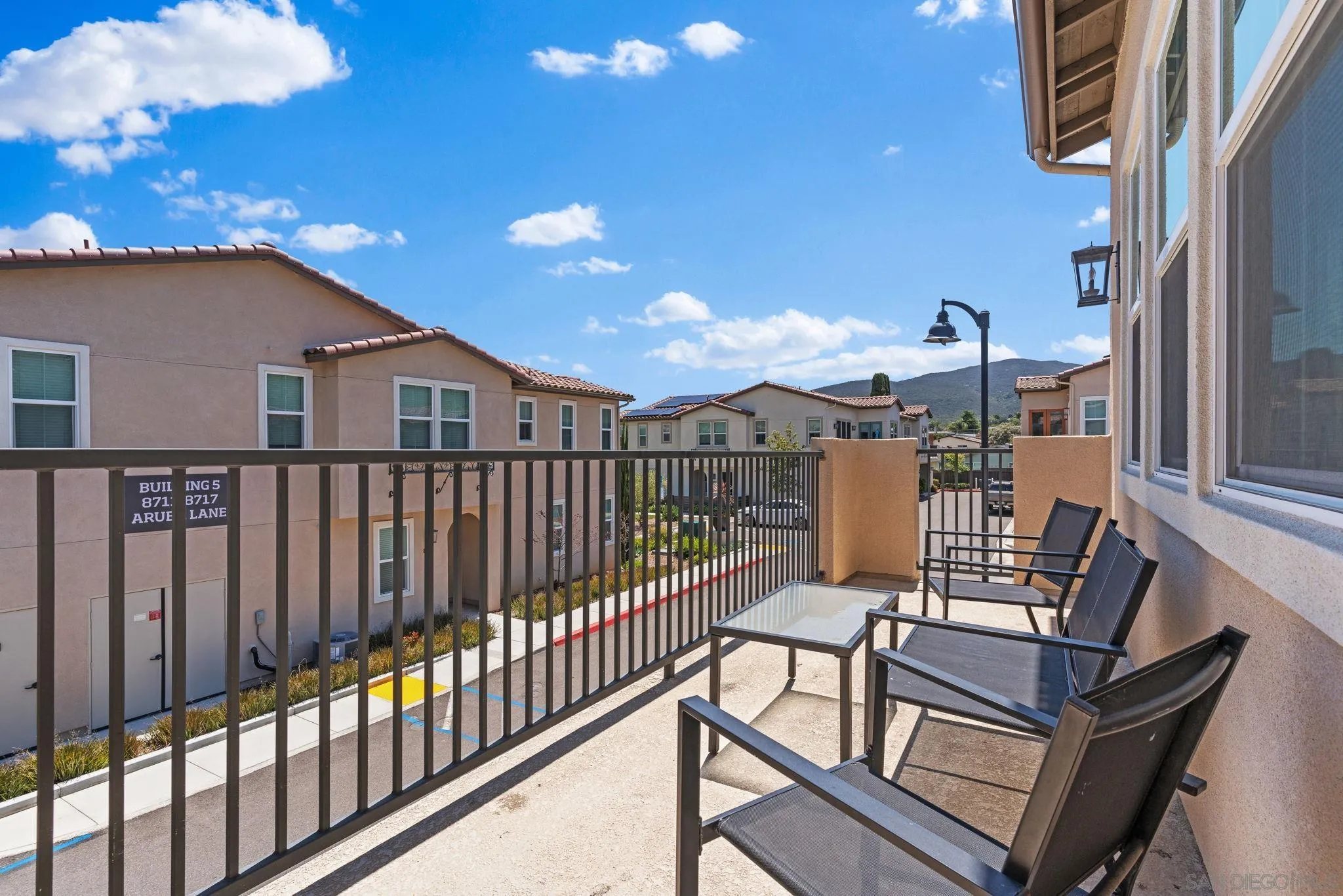 8702 Barbados Lane Santee, CA 92071 - Photo 31 of 39 a view of a balcony with chairs