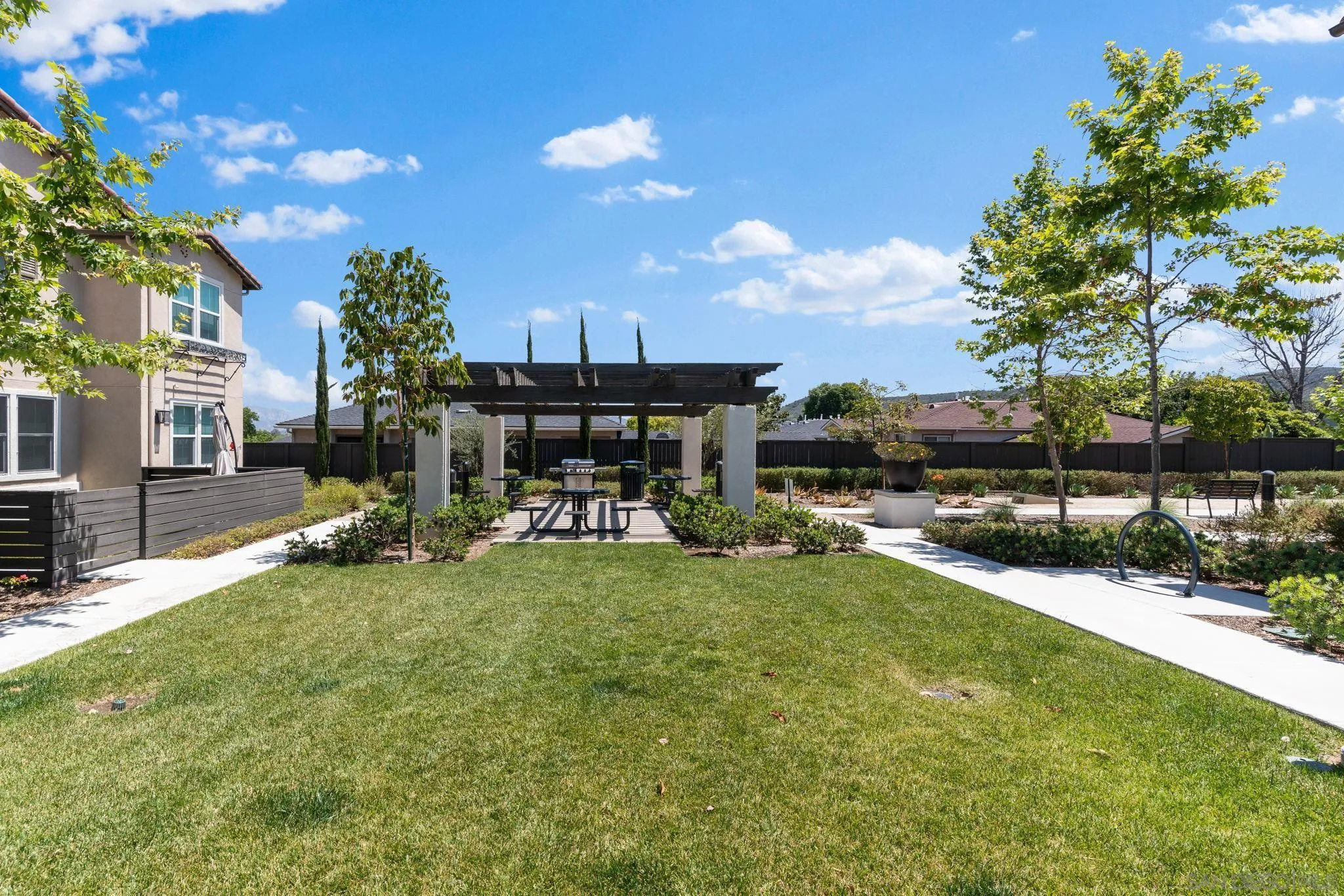 8702 Barbados Lane Santee, CA 92071 - Photo 39 of 39 a view of a backyard with sitting area