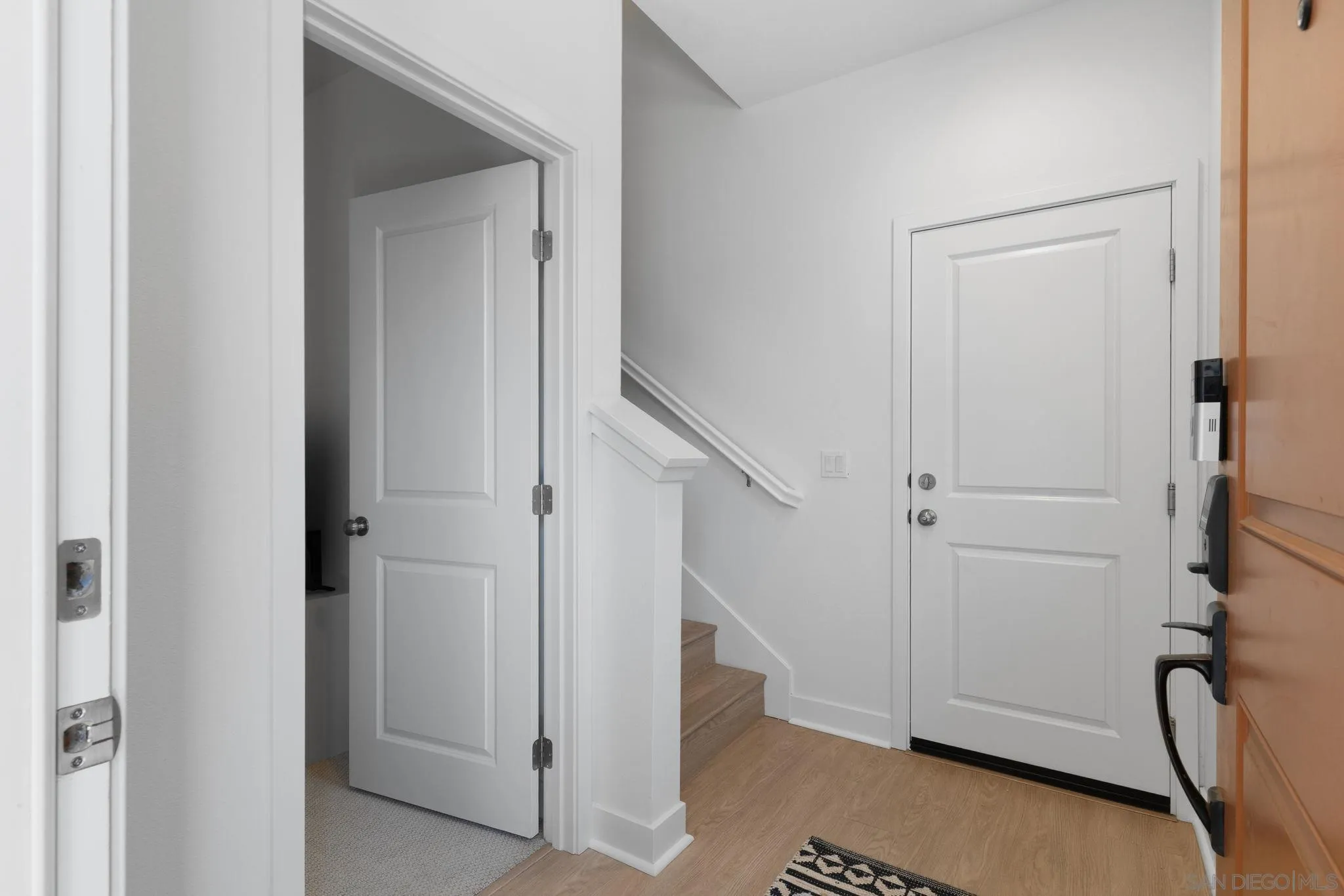 8702 Barbados Lane Santee, CA 92071 - Photo 6 of 39 a view of an entryway with hallway