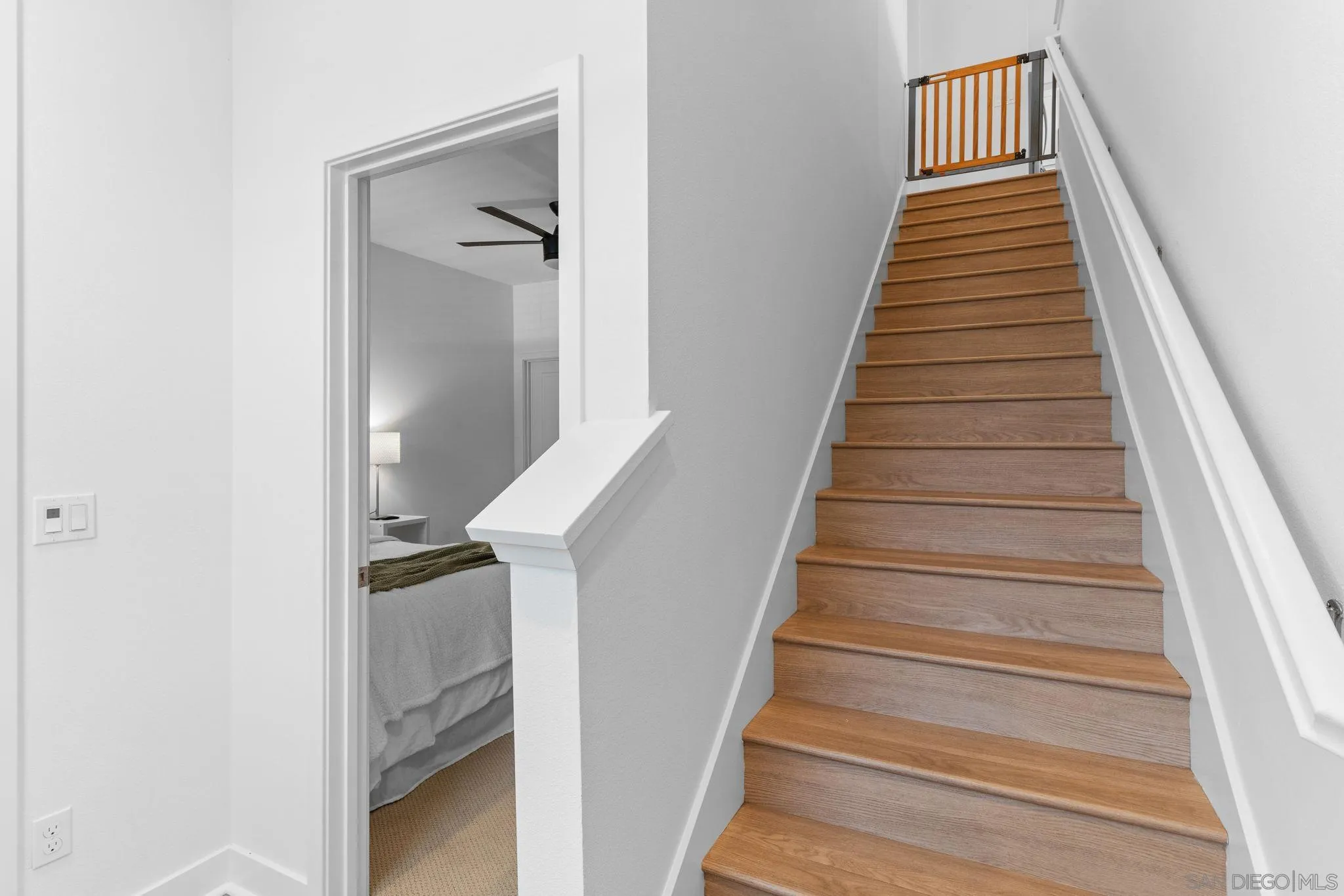 8702 Barbados Lane Santee, CA 92071 - Photo 10 of 39 a view of entryway and hall with wooden floor
