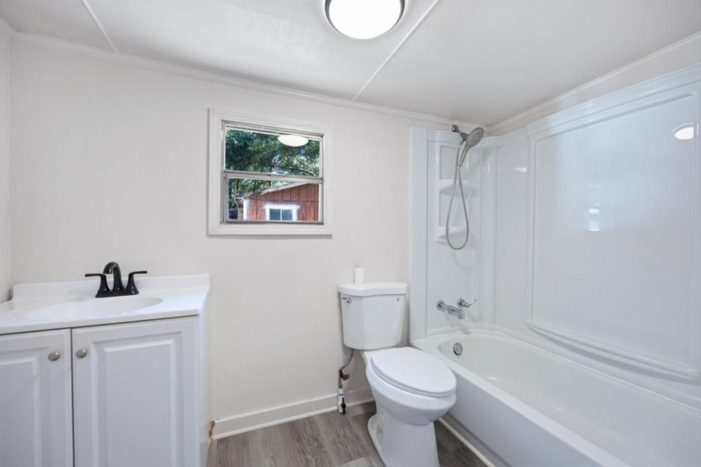 24 East Iron Belt Road Southeast Cartersville, GA 30120 - Photo 26 of 35 a bathroom with a sink toilet and shower