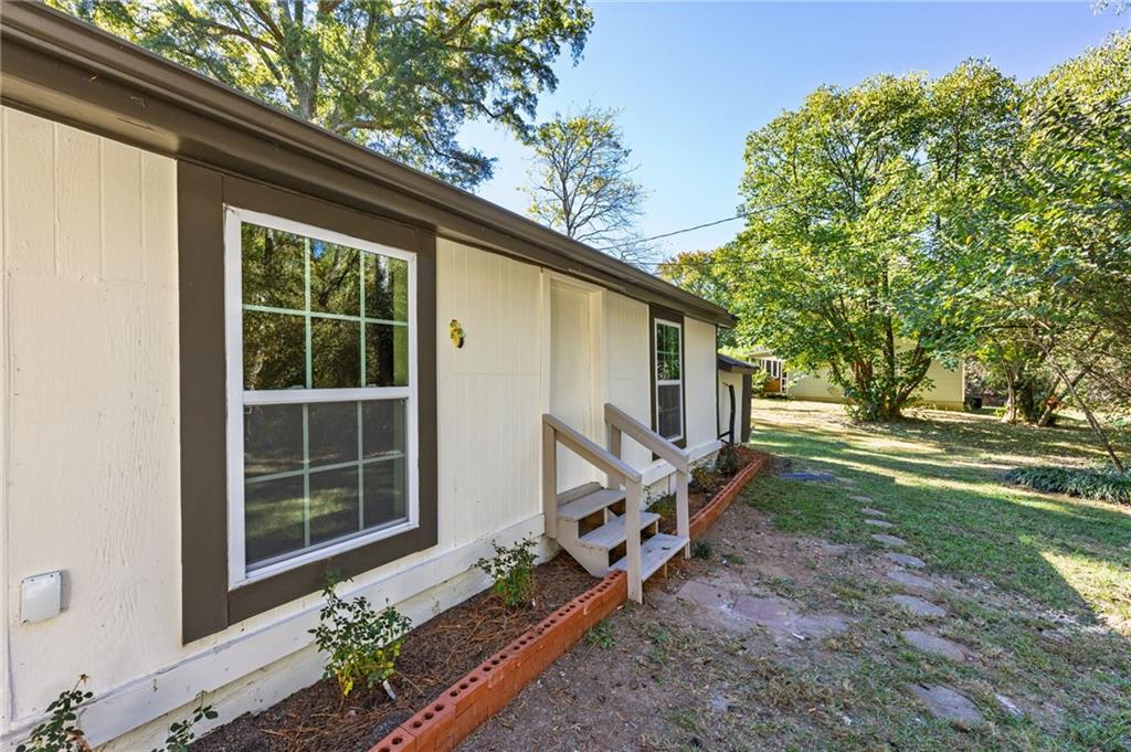 24 East Iron Belt Road Southeast Cartersville, GA 30120 - Photo 31 of 35 a backyard of a house with lots of green space