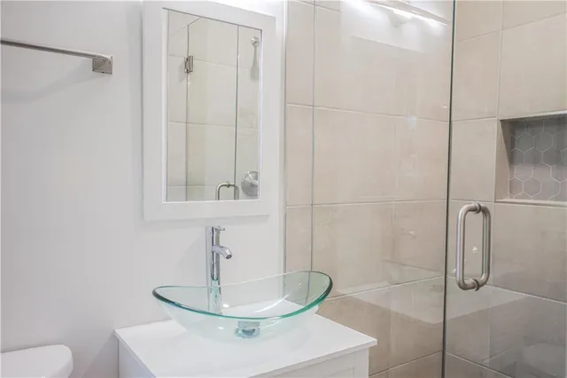 a view of hallway with sink