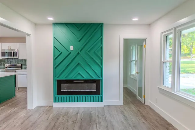 a view of entryway with wooden floor