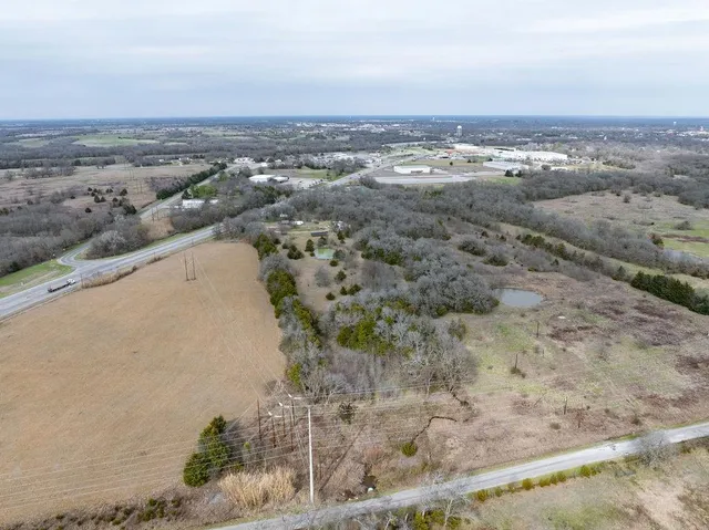an aerial view of beach and city