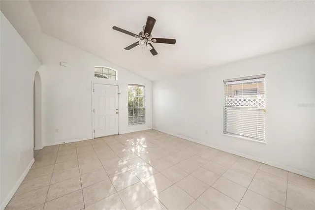 a view of an empty room and window