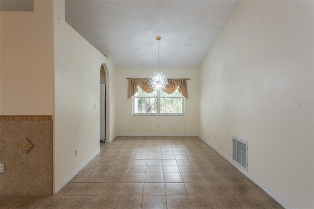 21 Comanche Court Palm Coast, FL 32137 - Photo 22 of 50 an empty room with windows