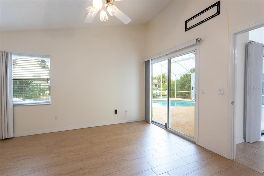 21 Comanche Court Palm Coast, FL 32137 - Photo 27 of 50 a view of an empty room with a window