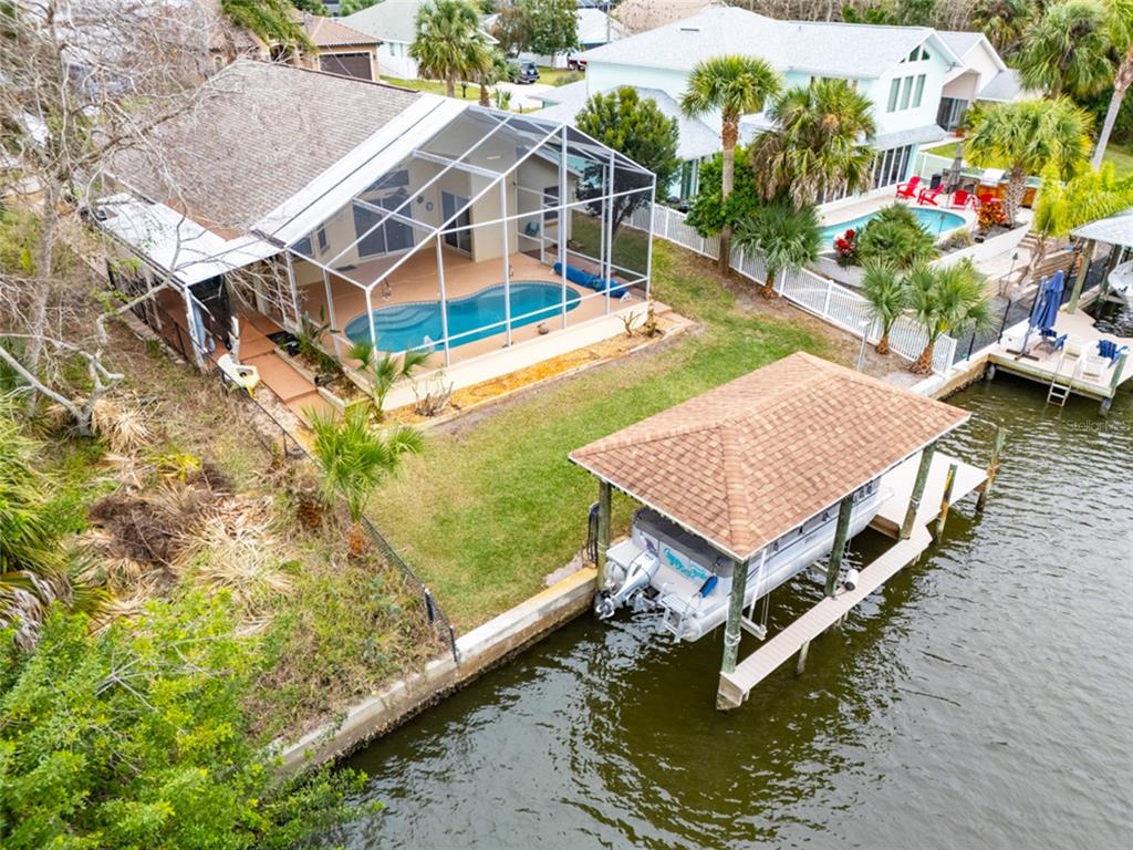 21 Comanche Court Palm Coast, FL 32137 - Photo 33 of 50 an aerial view of a house with swimming pool