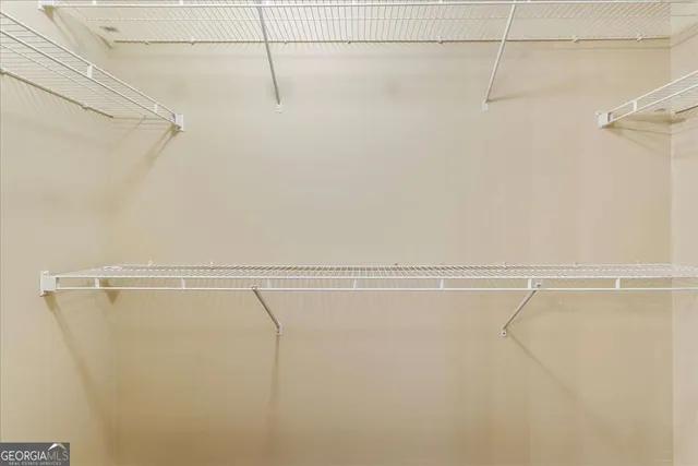 a view of a room with racks on the wall