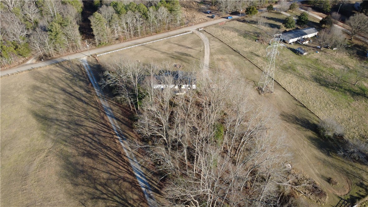 145 Finley Road Belton, SC 29627 - Photo 5 of 9 This expansive lot offers ample space for various outdoor pursuits and potential development.