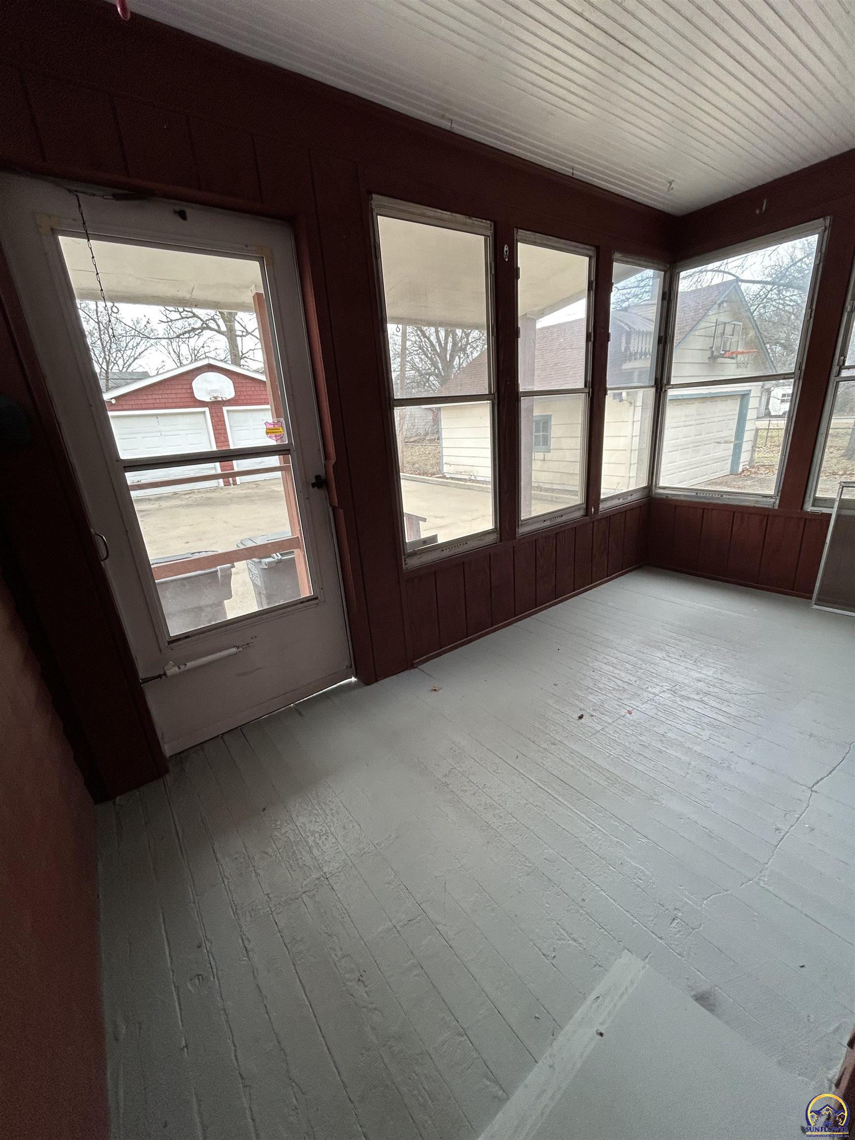 1513 Rural Street Emporia, KS 66801 - Photo 17 of 29 Enclosed back porch