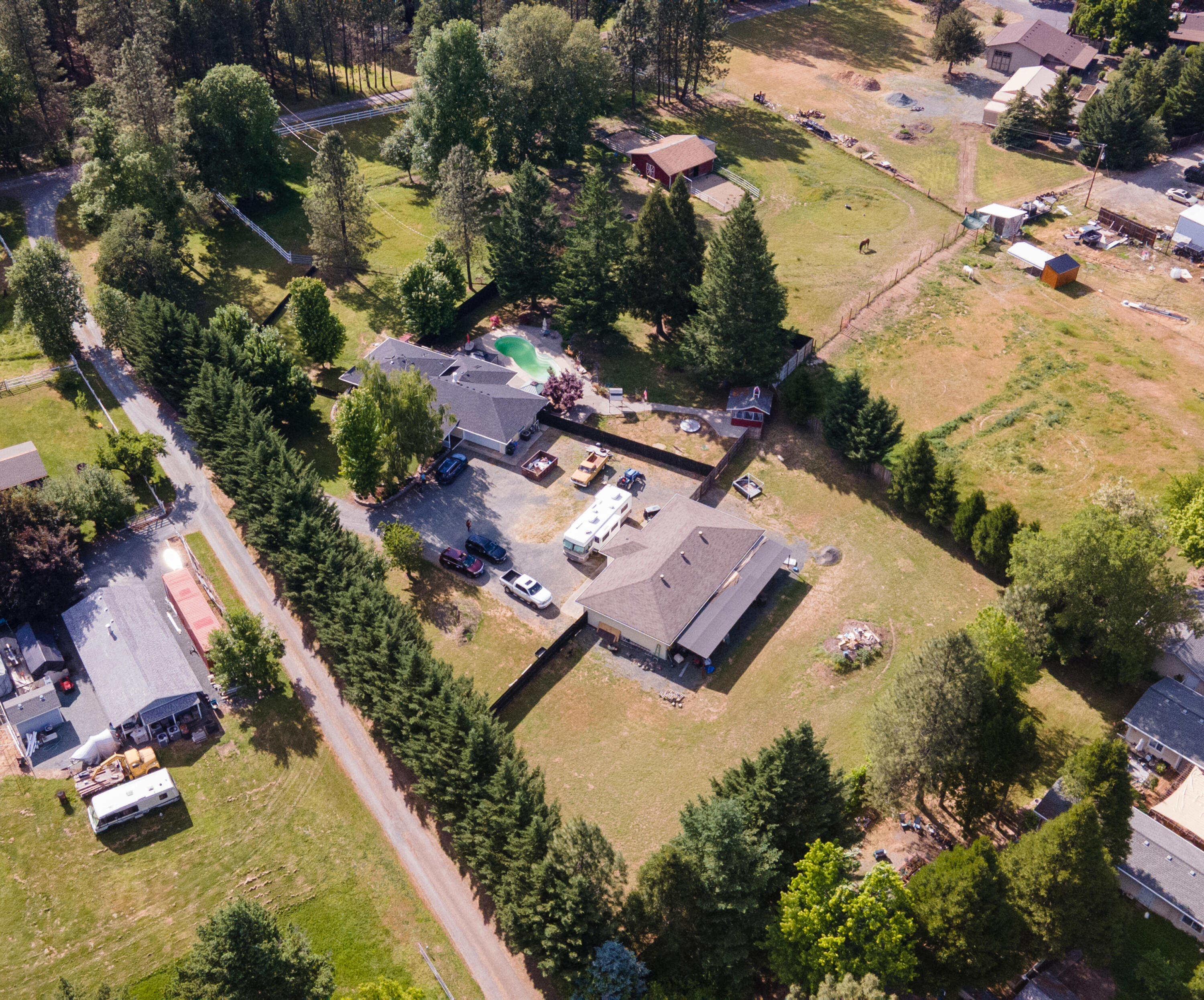 255 Queens Branch Road Rogue River, OR 97537 - Photo 55 of 60 an aerial view of residential houses with outdoor space