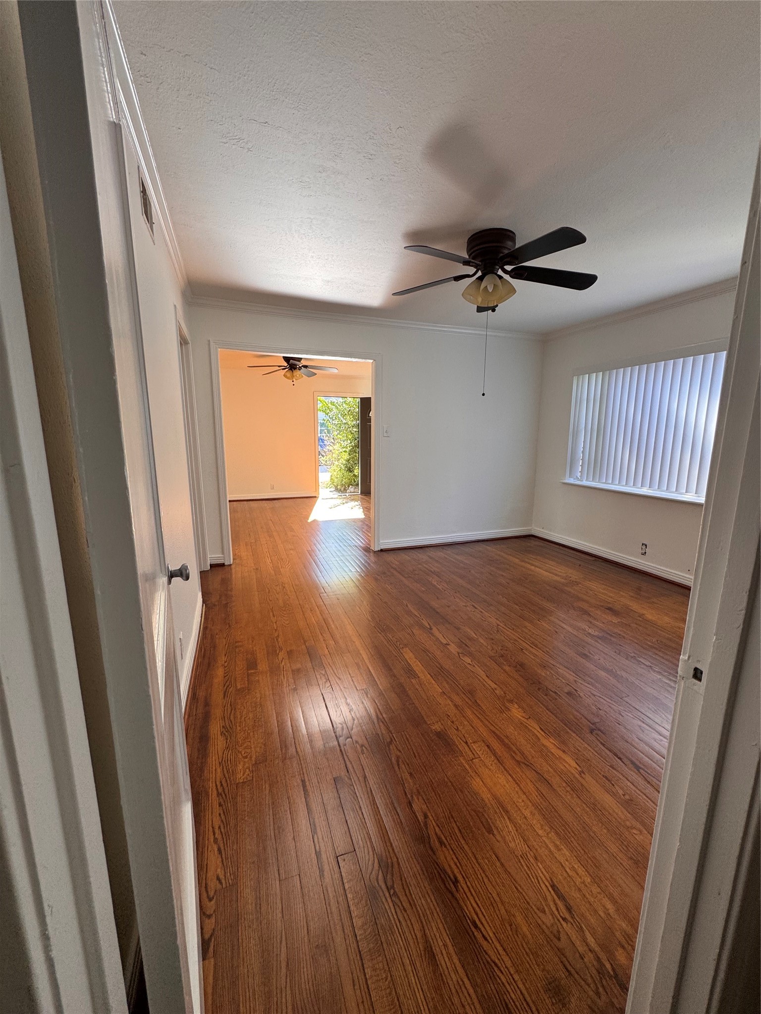 2646 Persa Street, Unit 1 Houston, TX 77098 - Photo 12 of 14 wooden floor in an empty room with a window