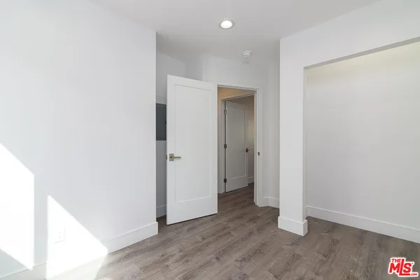 a view of entryway with wooden floor