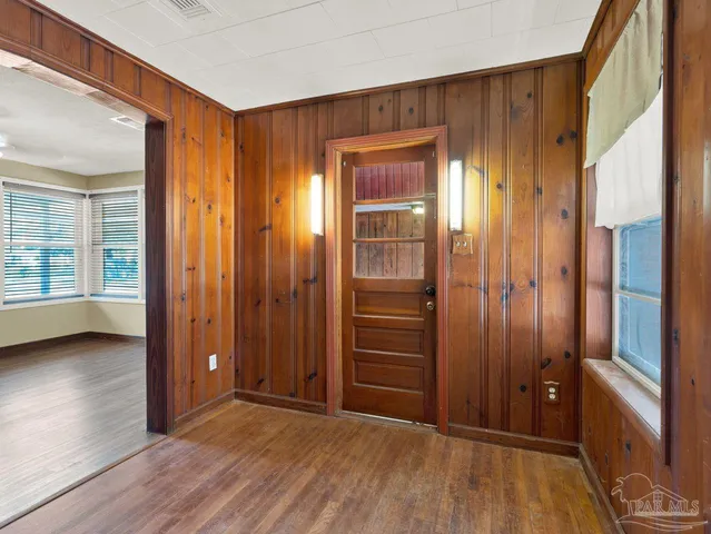 wooden floor and windows in an empty room