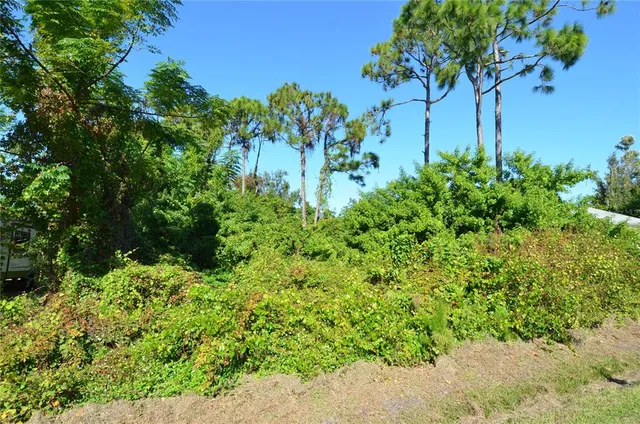 an aerial view of a city with lots of residential buildings
