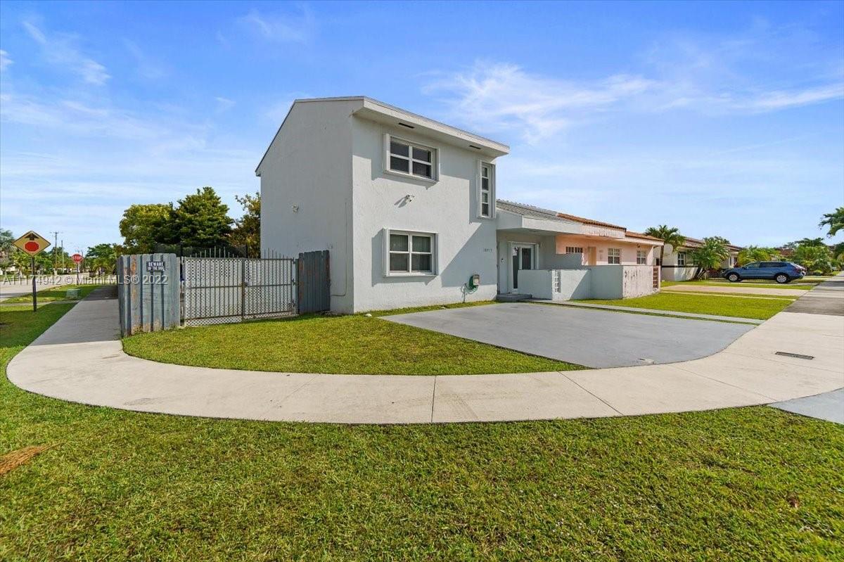 10975 Southwest 38th Terrace Miami, FL 33165 - Photo 1 of 21 a view of swimming pool with a yard