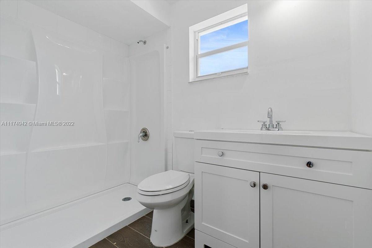 10975 Southwest 38th Terrace Miami, FL 33165 - Photo 11 of 21 a bathroom with a sink a toilet and shower