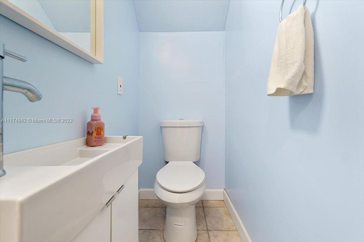 10975 Southwest 38th Terrace Miami, FL 33165 - Photo 14 of 21 a bathroom with a toilet and a sink