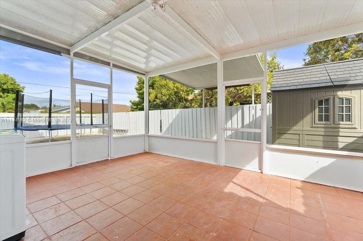 10975 Southwest 38th Terrace Miami, FL 33165 - Photo 16 of 21 a view of an outdoor space with porch