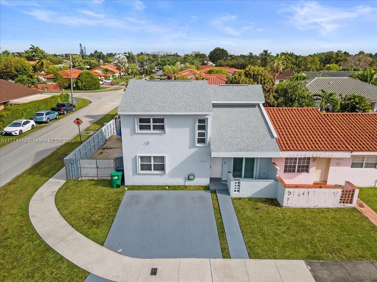 10975 Southwest 38th Terrace Miami, FL 33165 - Photo 3 of 21 an aerial view of a house with a yard basket ball court and outdoor seating