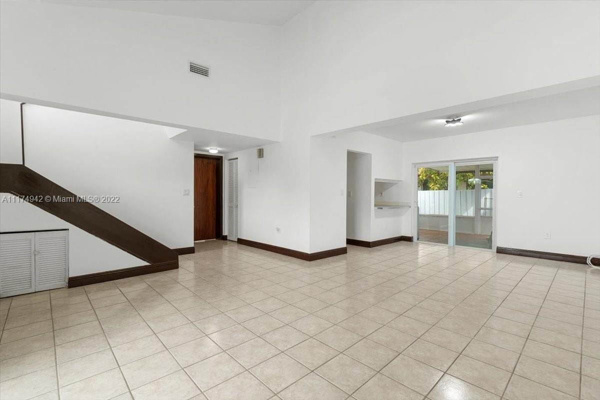 10975 Southwest 38th Terrace Miami, FL 33165 - Photo 4 of 21 an empty room with windows