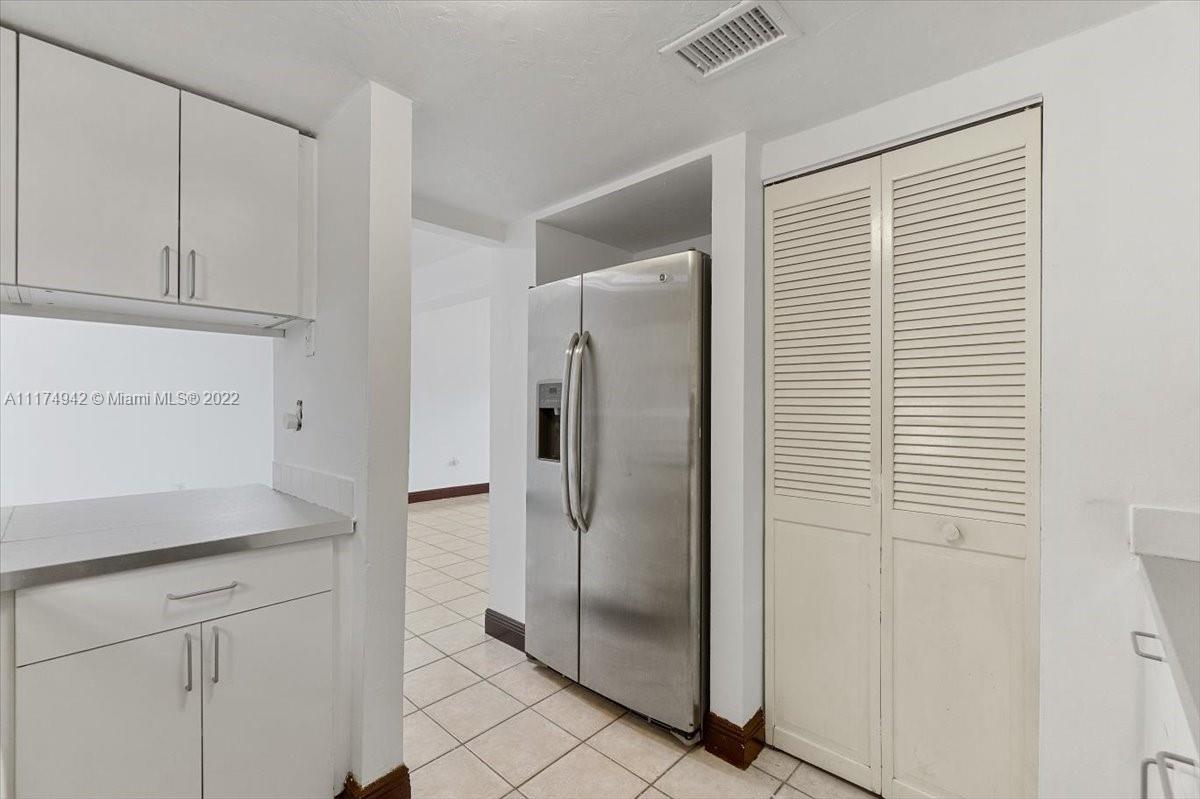 10975 Southwest 38th Terrace Miami, FL 33165 - Photo 8 of 21 a bathroom with a shower and closet