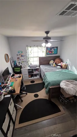 a room with a couch and a window