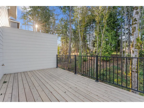 a view of balcony with wooden floor