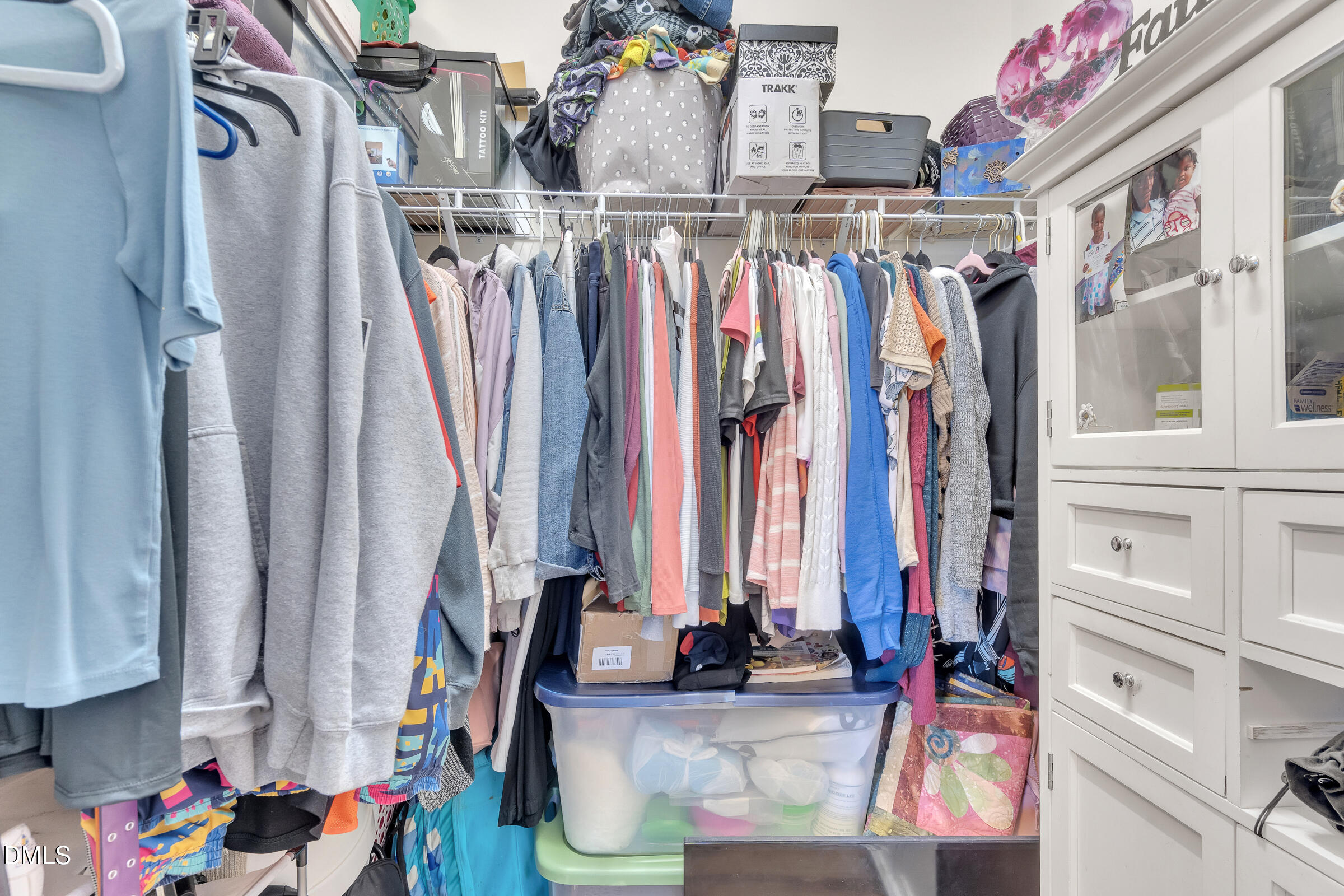 904 East Jones Street Raleigh, NC 27601 - Photo 10 of 21 a view of walk in closet with clothes