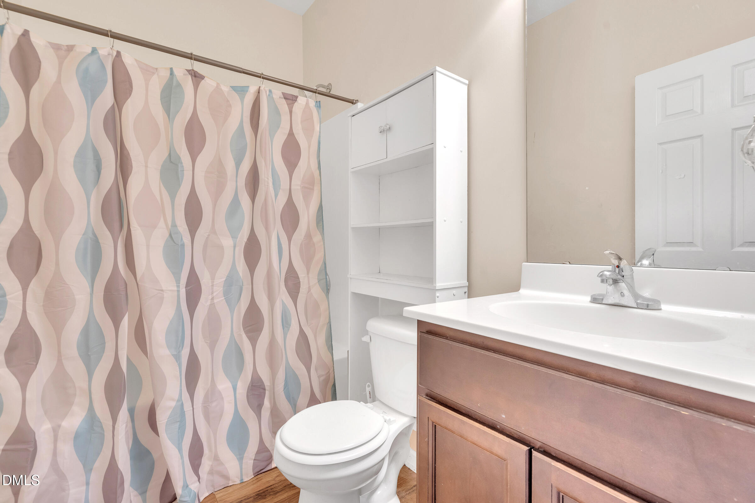 904 East Jones Street Raleigh, NC 27601 - Photo 18 of 21 a bathroom with a sink toilet and shower
