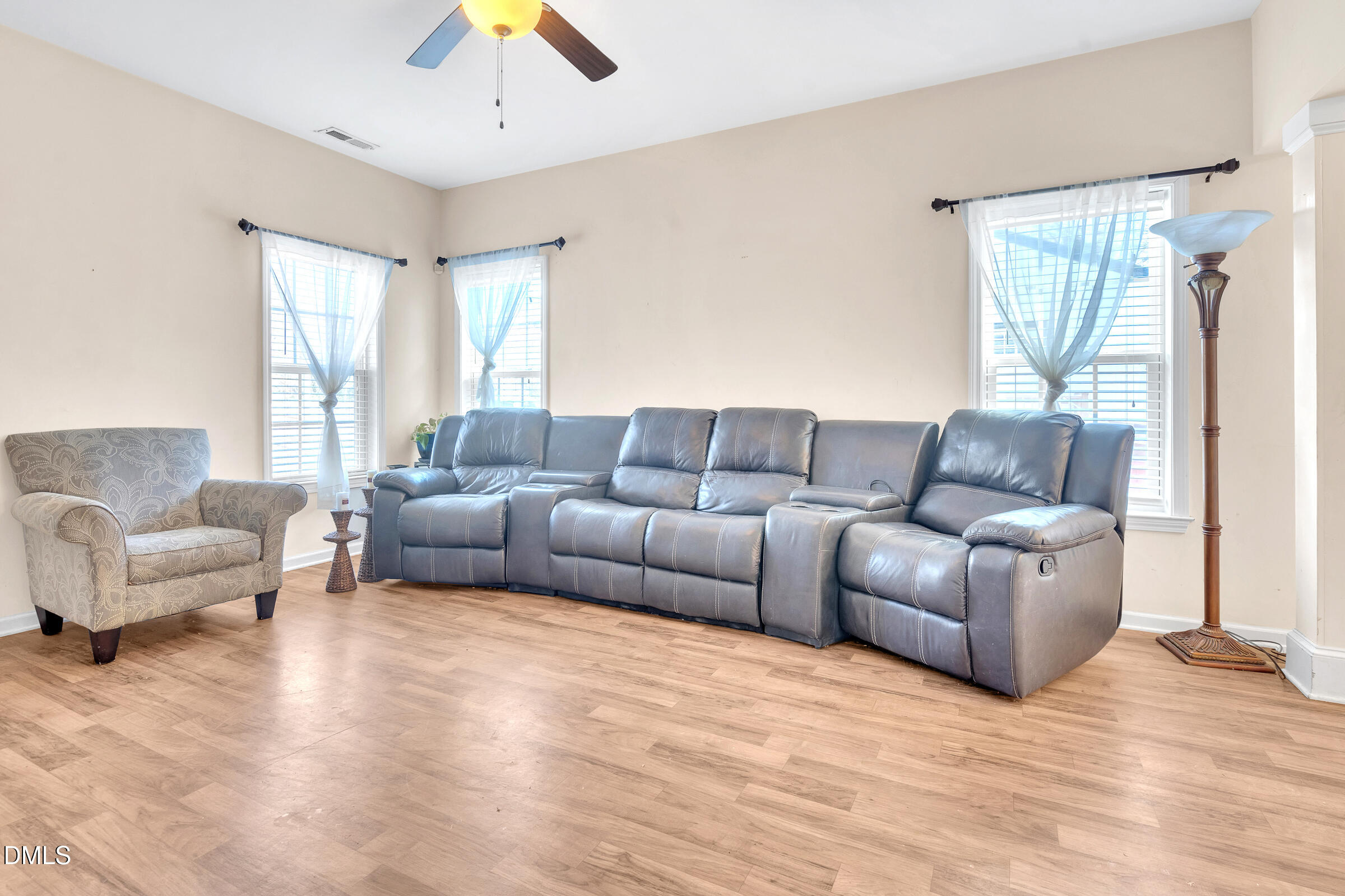 904 East Jones Street Raleigh, NC 27601 - Photo 4 of 21 a living room with furniture and a large window
