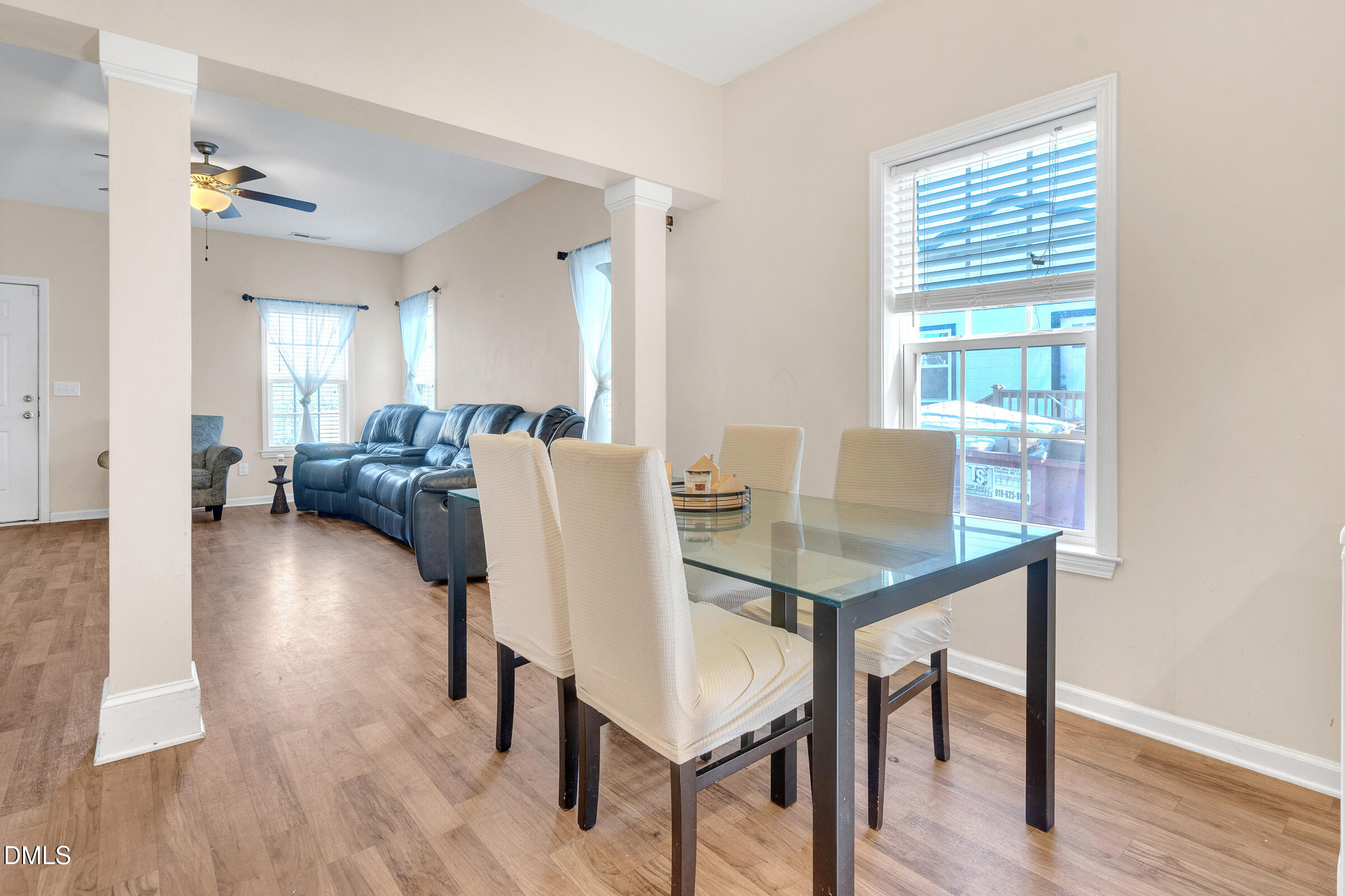 904 East Jones Street Raleigh, NC 27601 - Photo 5 of 21 a view of a dining room with furniture and wooden floor