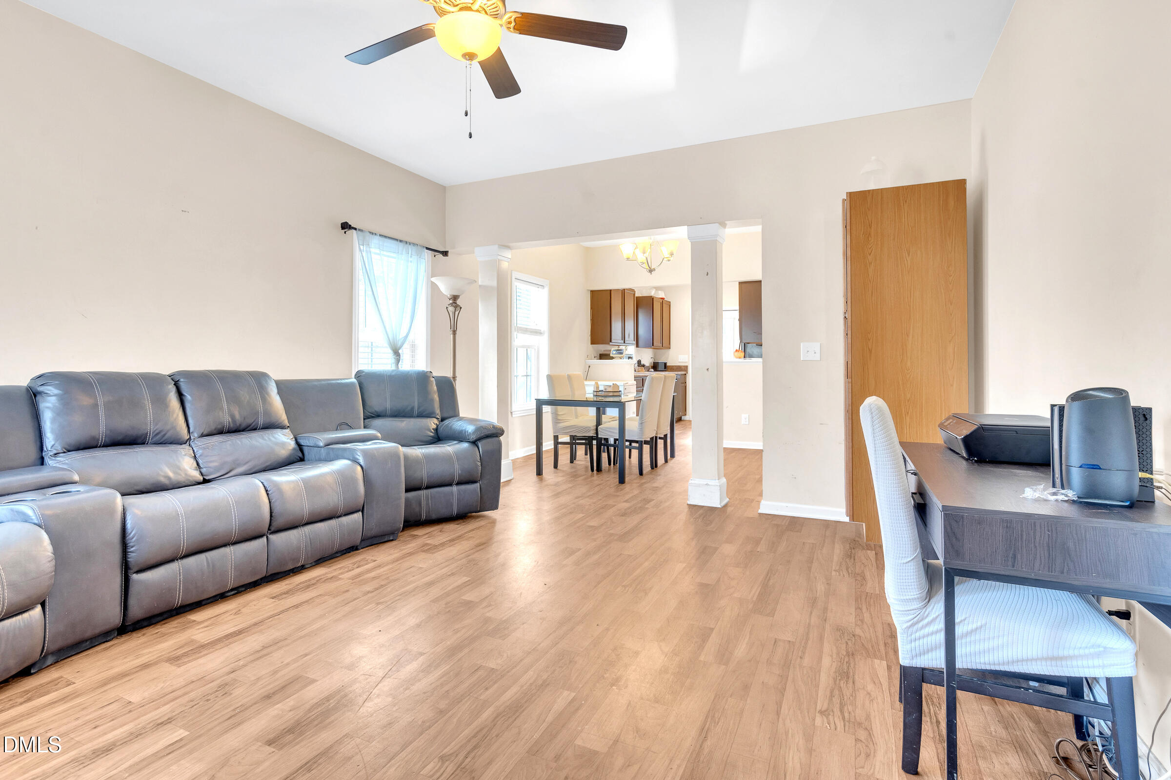 904 East Jones Street Raleigh, NC 27601 - Photo 6 of 21 a living room with furniture and a wooden floor