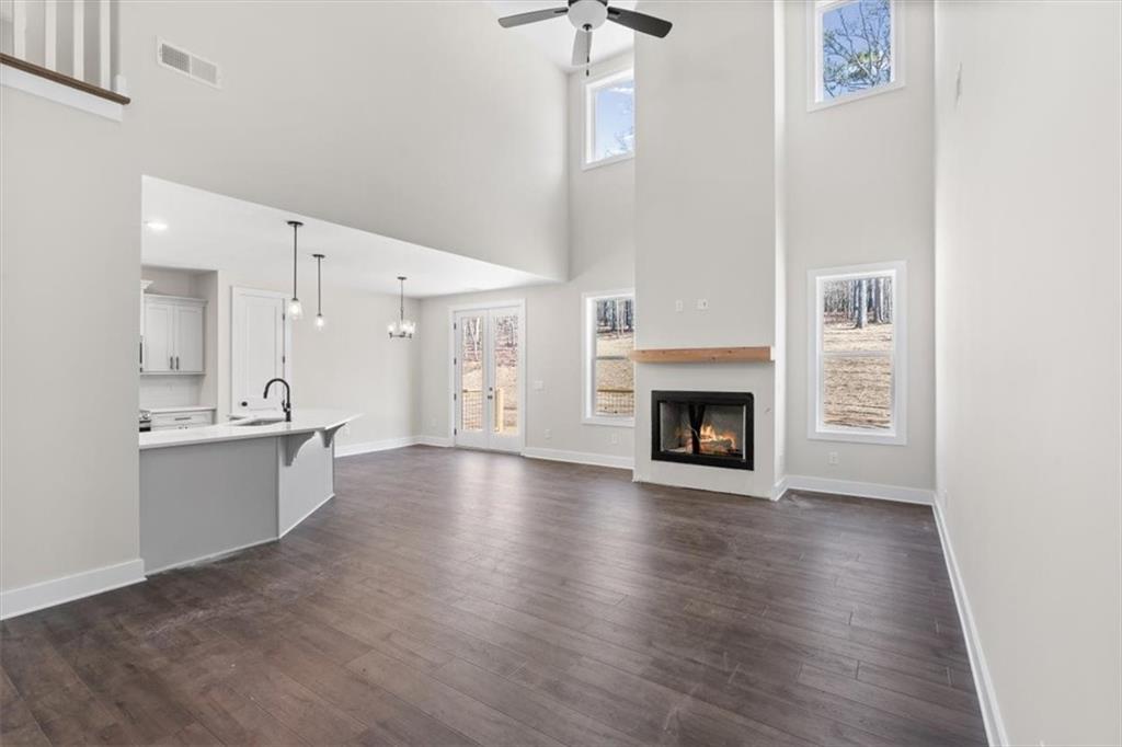 14 Everwood Court Rome, GA 30161 - Photo 11 of 54 a view of a kitchen with a sink a fireplace and a window