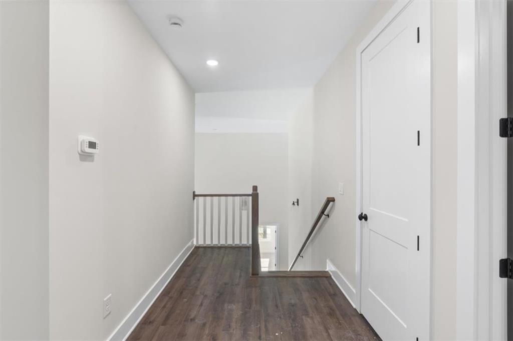 14 Everwood Court Rome, GA 30161 - Photo 40 of 54 a view of a hallway with wooden floor and staircase