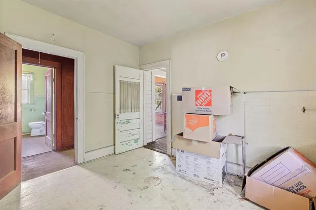 a bedroom with furniture and window