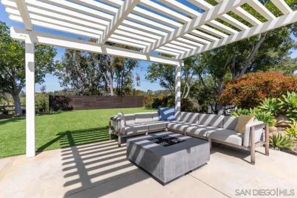 an aerial view of a house with a garden