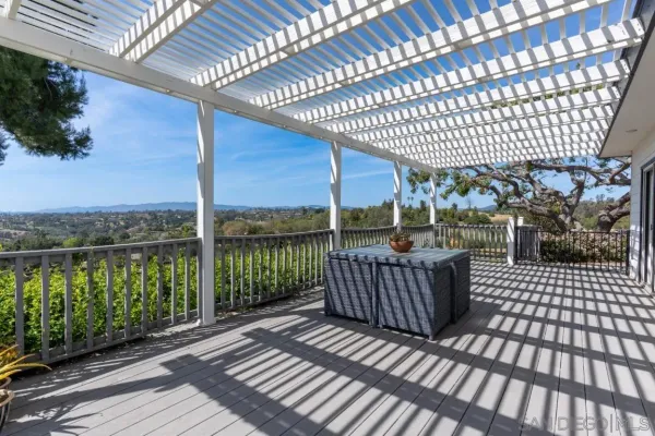 an aerial view of a house with a yard and garden