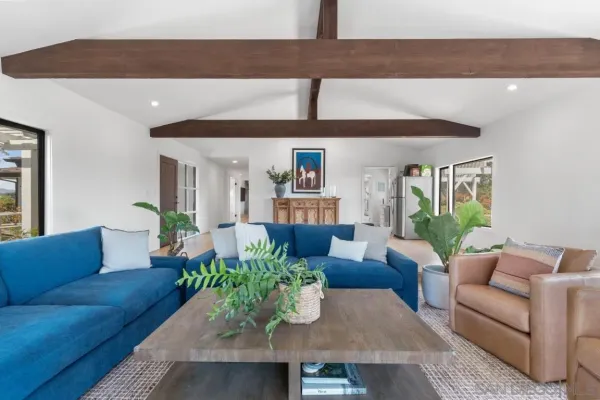 a living room with furniture and a couch