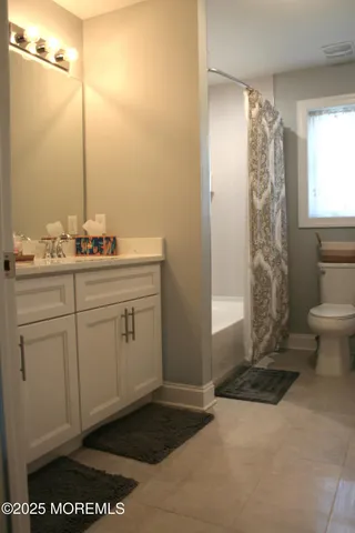 a front view of a house with parking