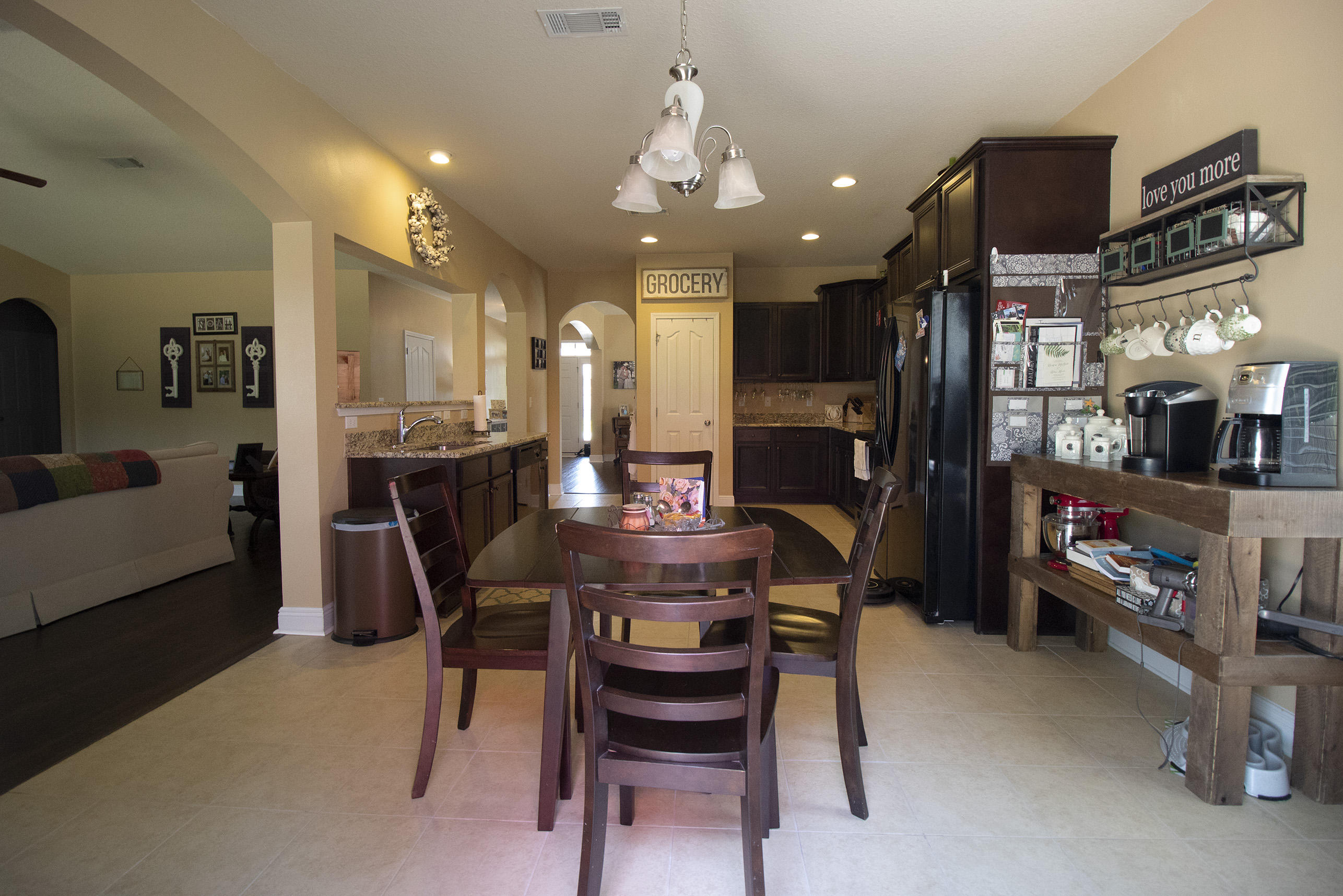 206 Mango Lane Freeport, FL 32439 - Photo 21 of 45 a view of a dining room with furniture