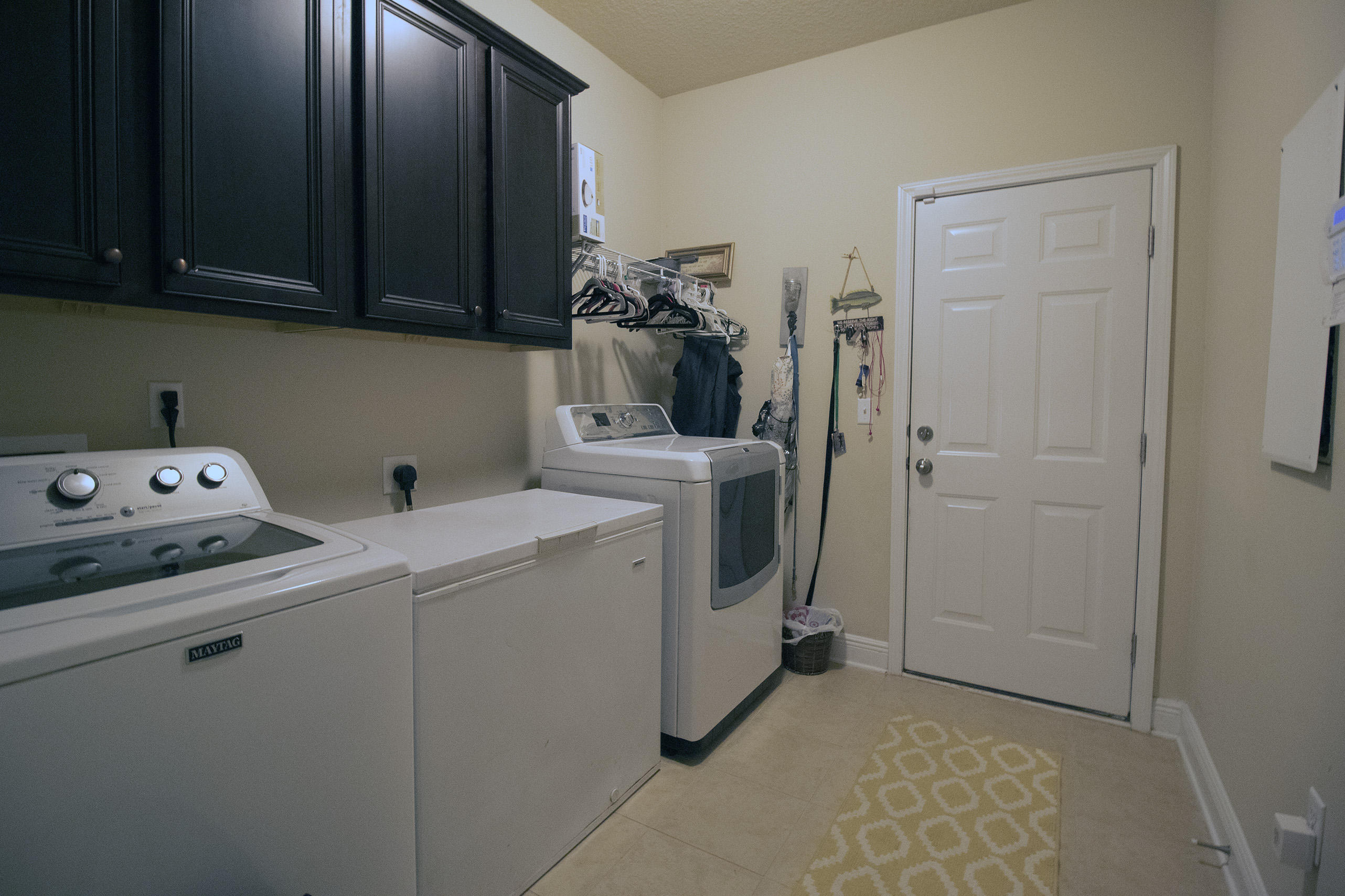206 Mango Lane Freeport, FL 32439 - Photo 25 of 45 a utility room with dryer and washer