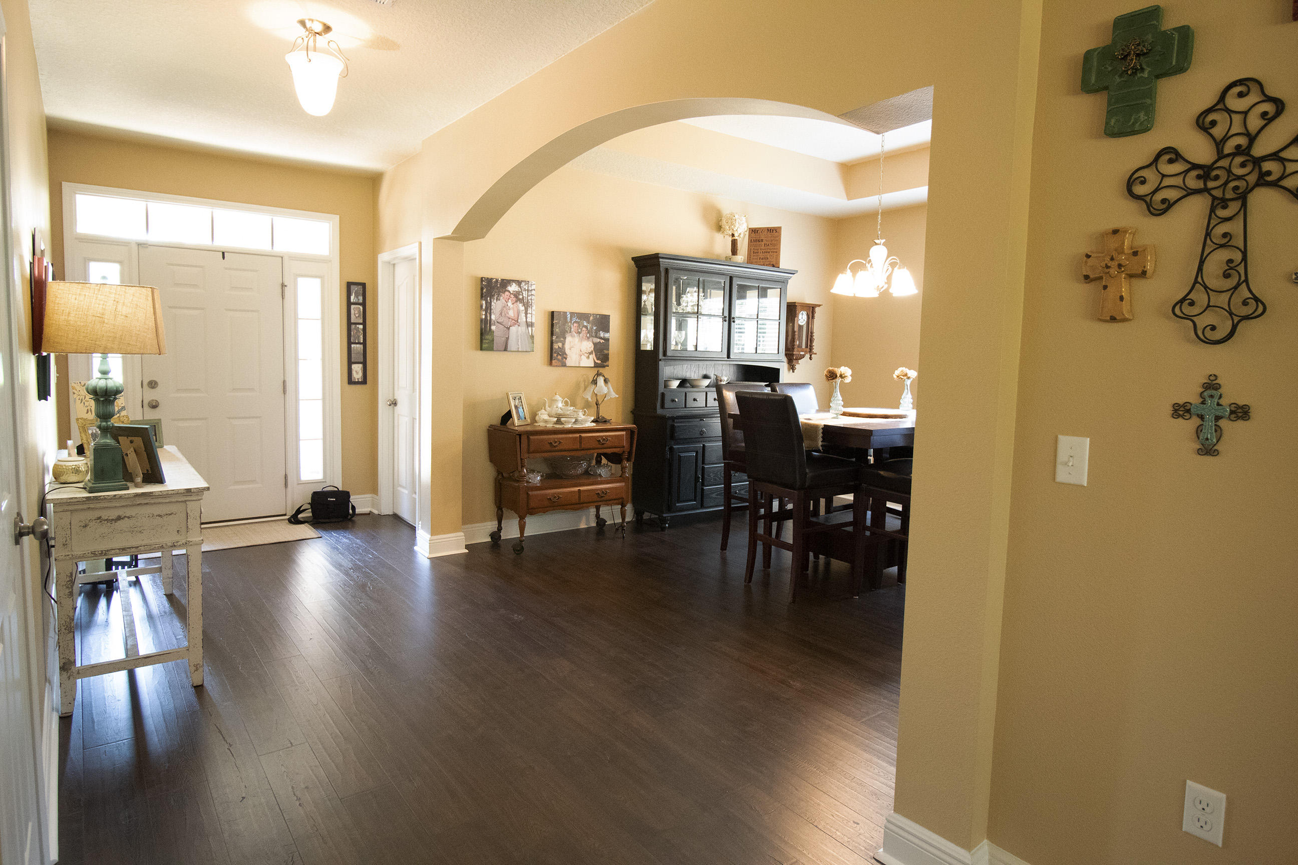 206 Mango Lane Freeport, FL 32439 - Photo 10 of 45 a view of a room with dining room and wooden floor