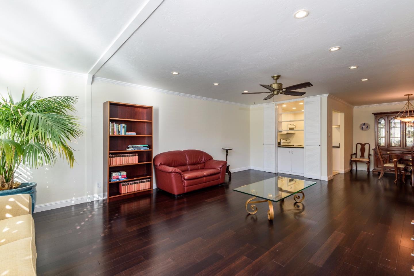 200 Elm Street, Unit 107 San Mateo, CA 94401 - Photo 5 of 11 a living room with furniture and a wooden floor
