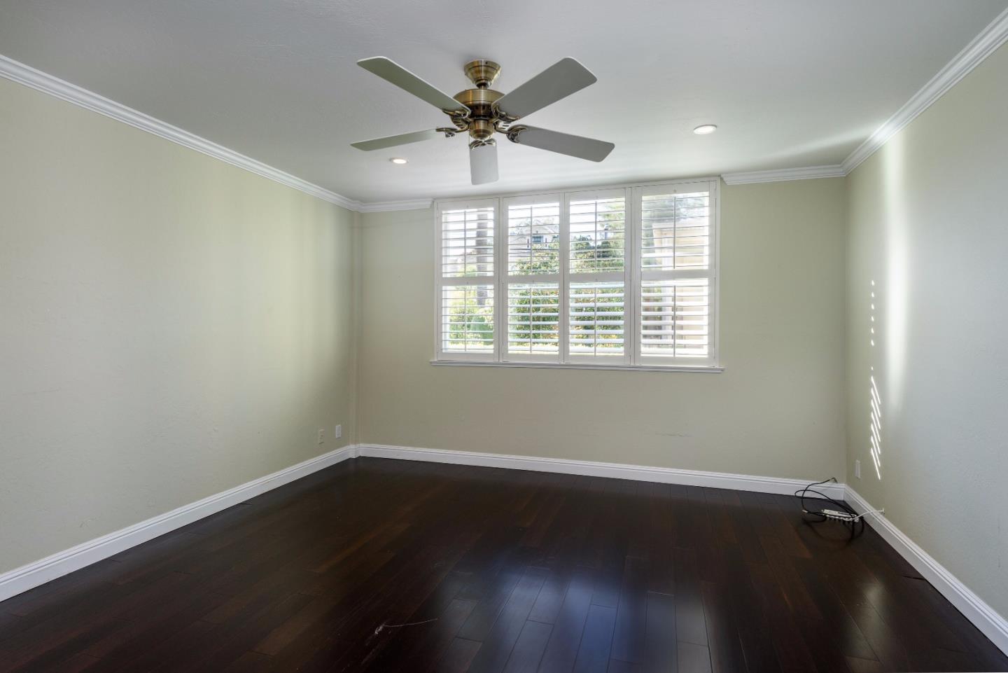 200 Elm Street, Unit 107 San Mateo, CA 94401 - Photo 7 of 11 a view of wooden floor and windows in a room