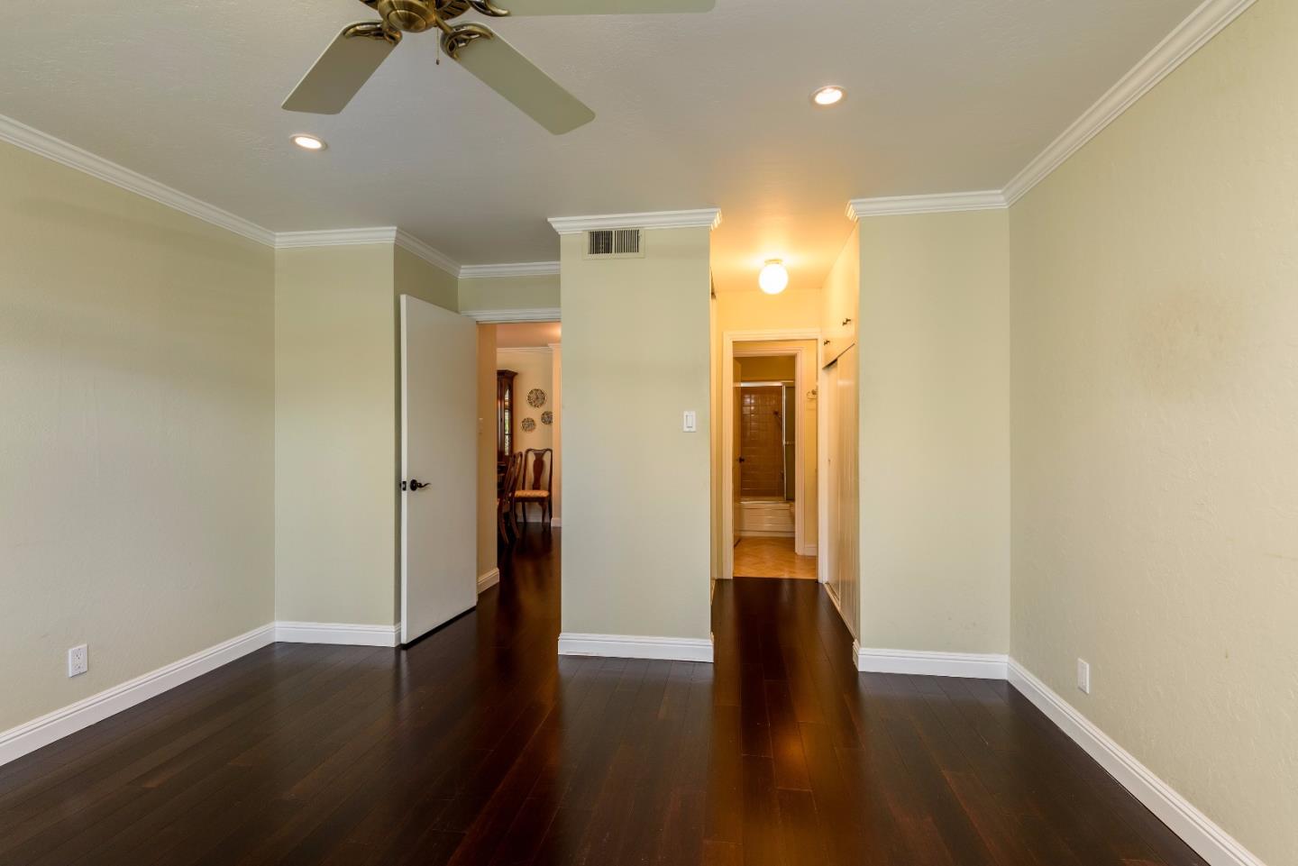 200 Elm Street, Unit 107 San Mateo, CA 94401 - Photo 8 of 11 a view of empty room with wooden floor