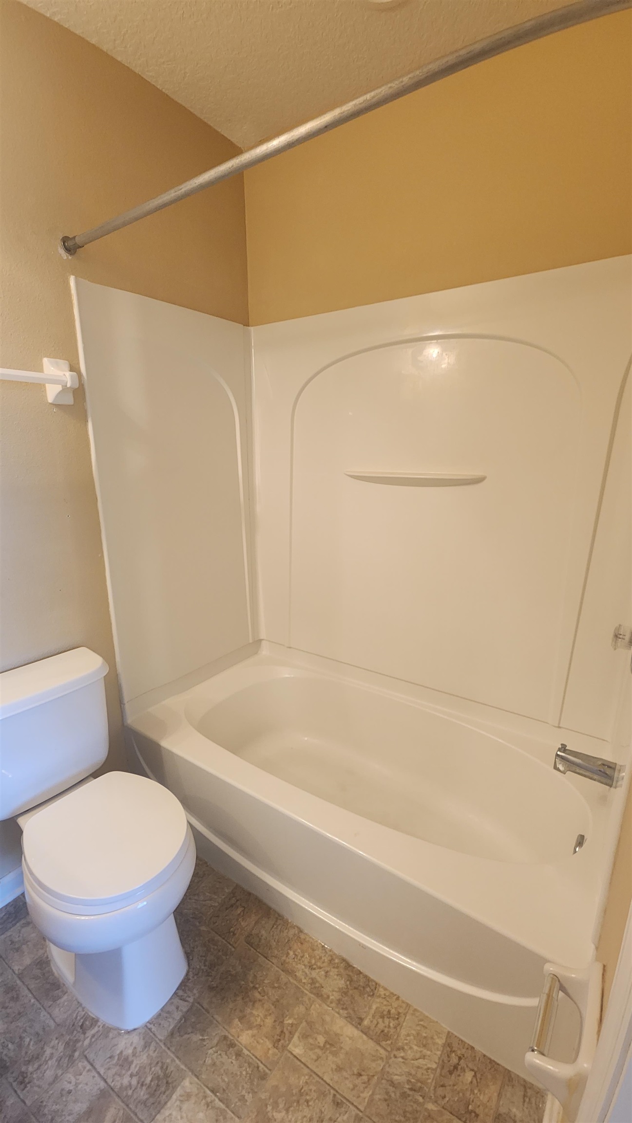 430 Cabernet Place St. Augustine, FL 32084 - Photo 14 of 19 a white toilet and tub sitting next to a bathroom sink